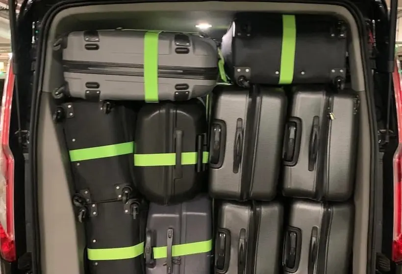 The boot loaded with suitcases for an airport run