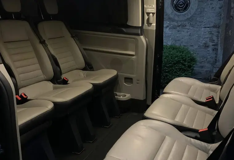 Cream leather seats through the open side door